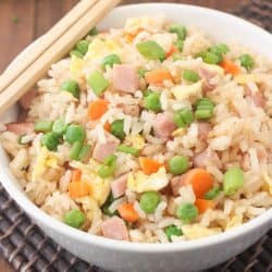 A bowl of fried rice with ham