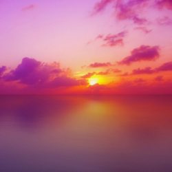 Sunsetting behind clouds